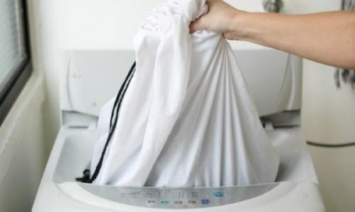 Как стирать портьерные шторы. Ручной или машинный способ стирки?
